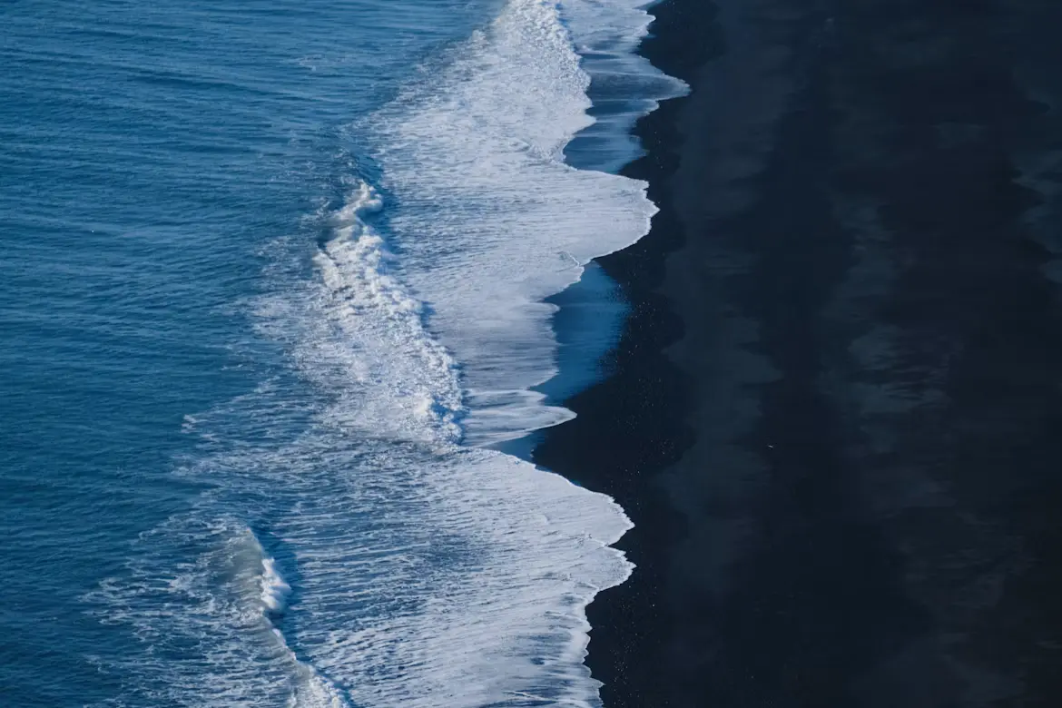 Receding tide revealing sand, representing disclosure obligations under the CMA regime