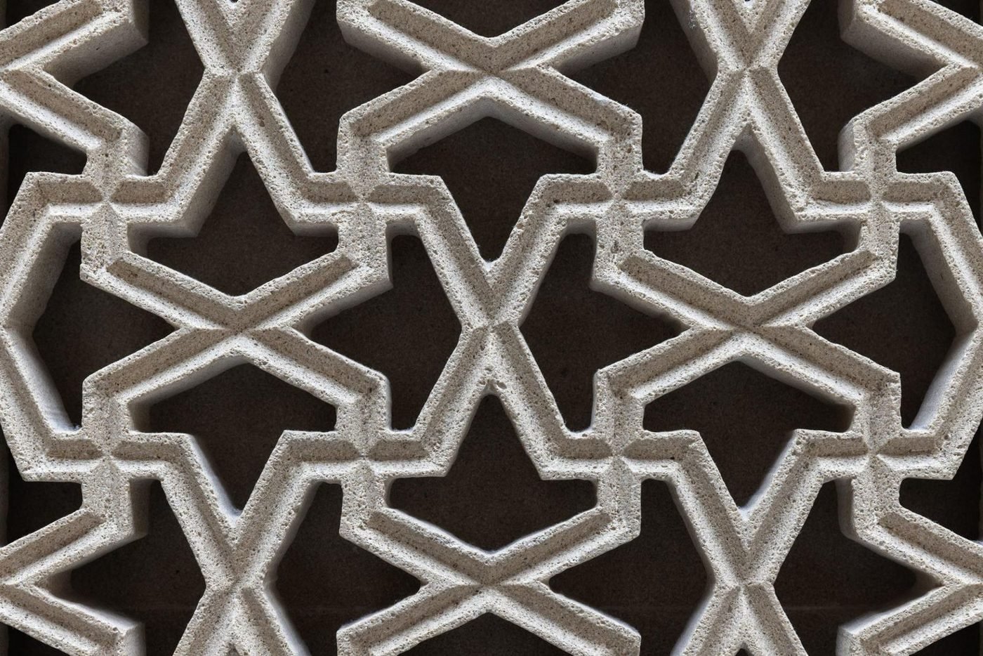 Carved geometric screen, for the Islamic finance practice