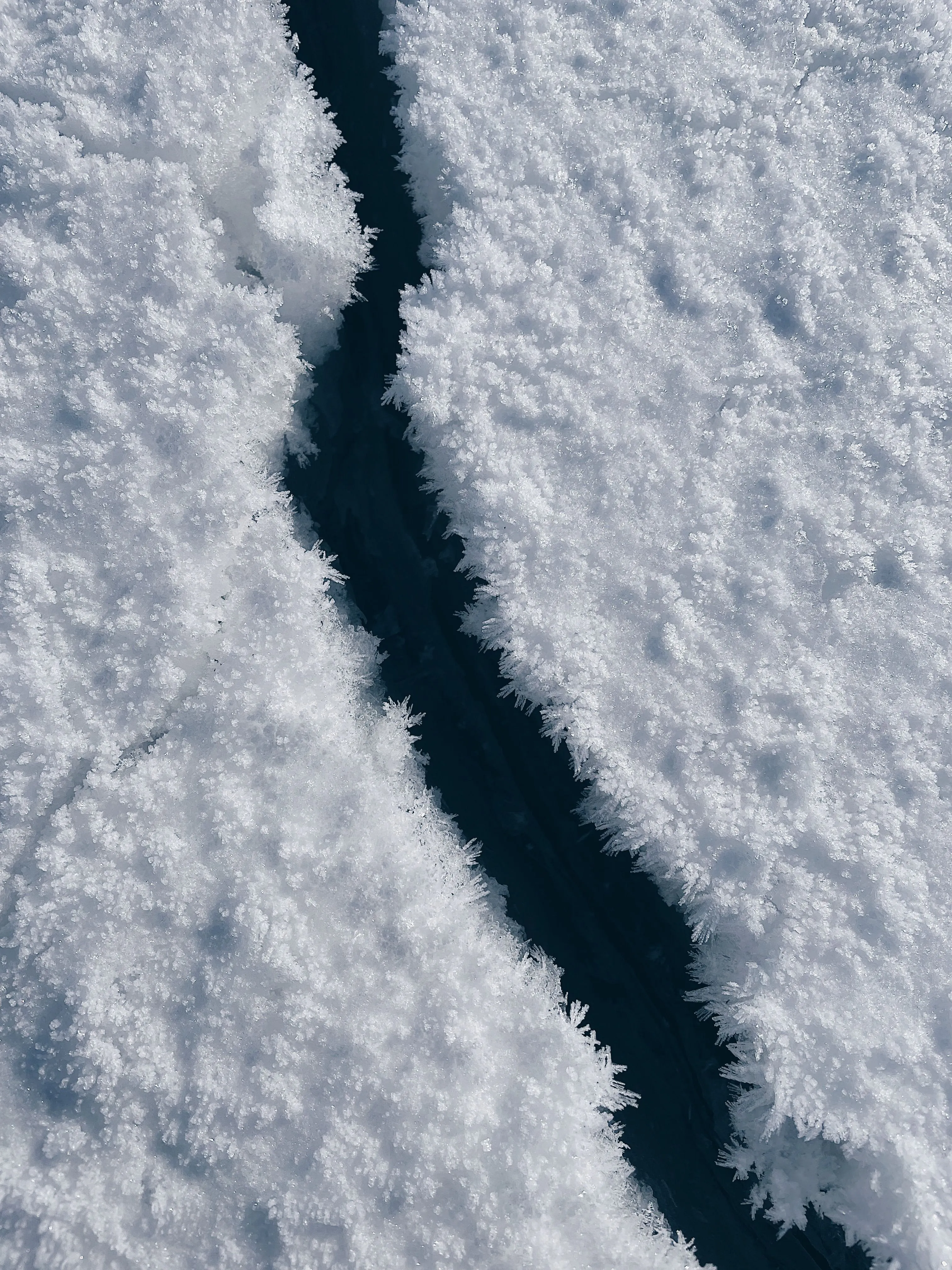 Cracked ice representing the untested ring-fence around client crypto in a UAE VASP insolvency
